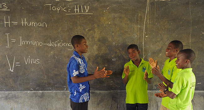 Boys learning about HIV in school