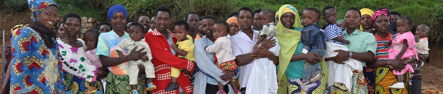 An a group of Rwandan women holding babies in their arms