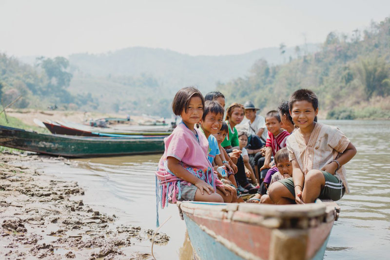 A group of children in a boat