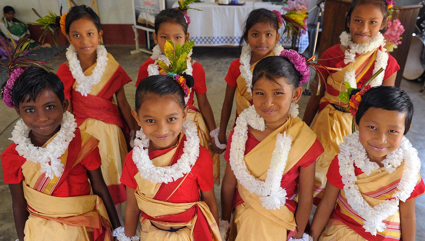 A group of girls from India dressed in colorful robes