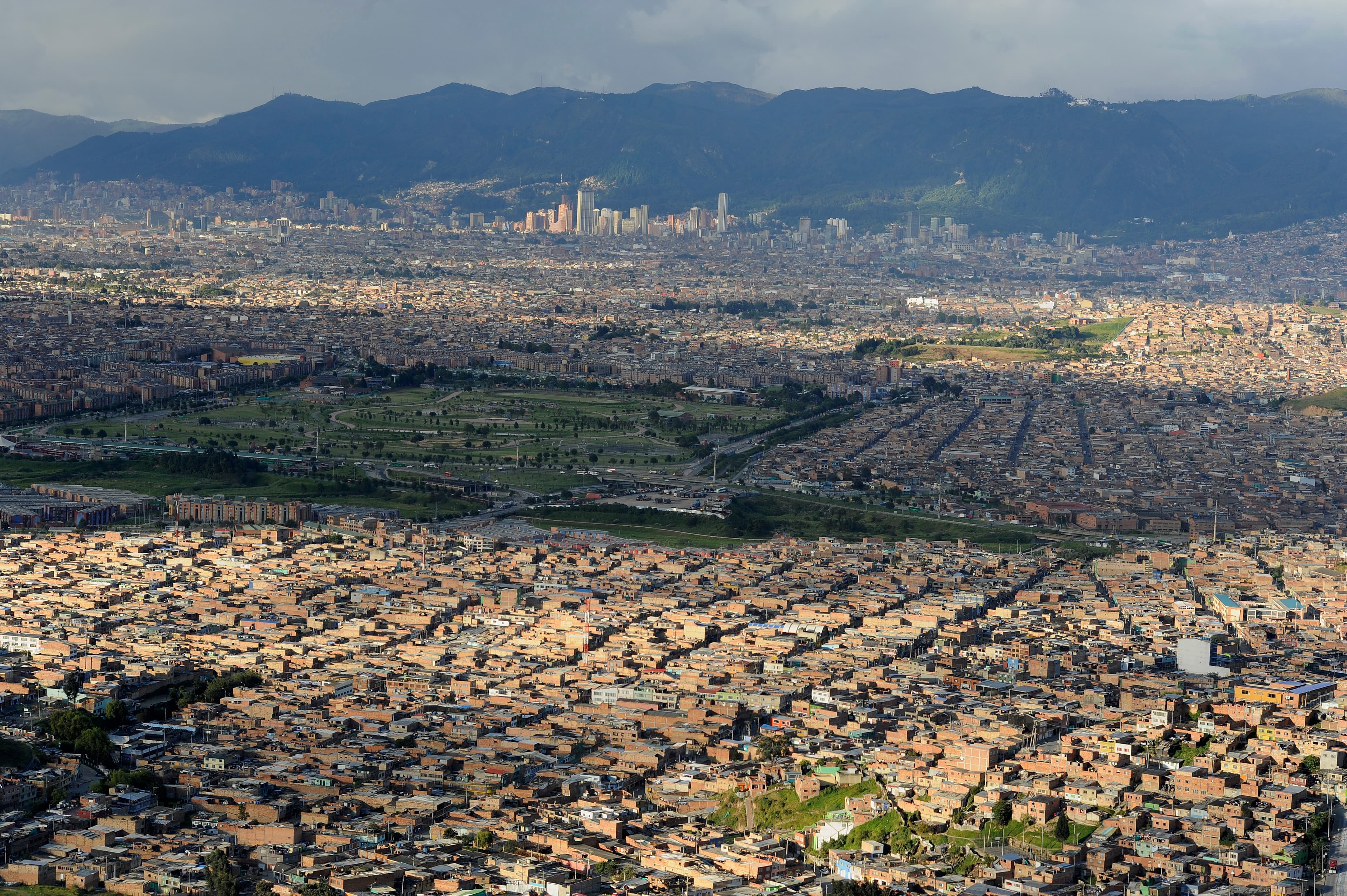 View of cityscape against mountain range