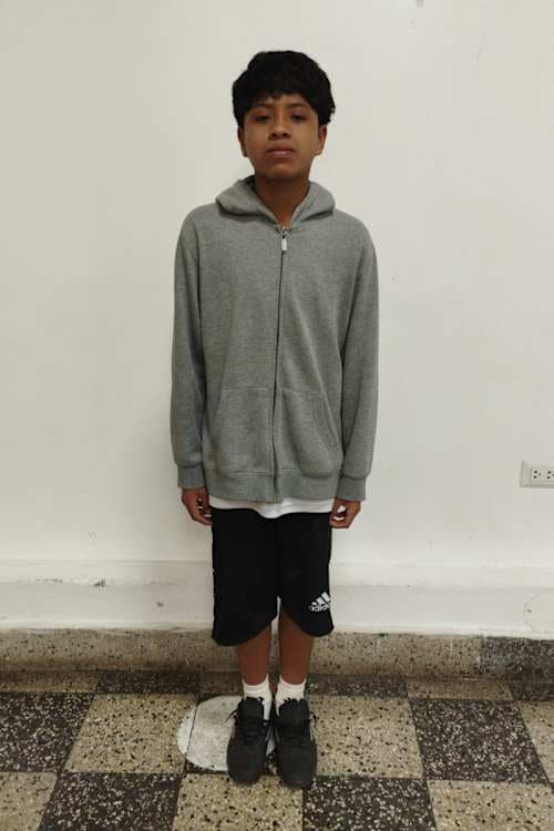 An unsponsored boy named Chino from Peru who has waited 536 days for a sponsor.