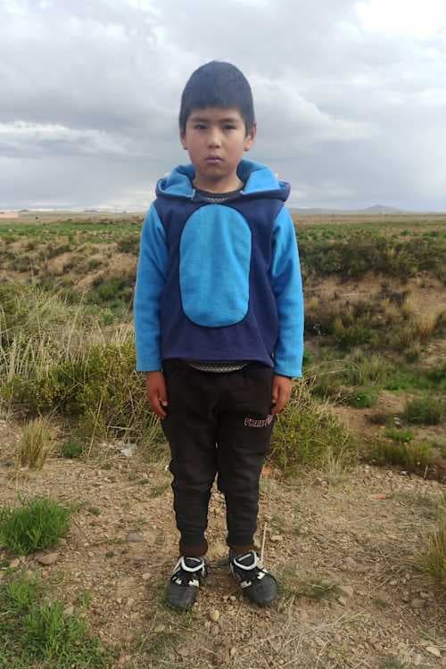 An unsponsored boy named Enoc from Bolivia who has waited 529 days for a sponsor.