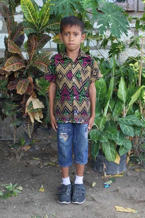 An unsponsored boy named Faisal from Indonesia who has waited 524 days for a sponsor.