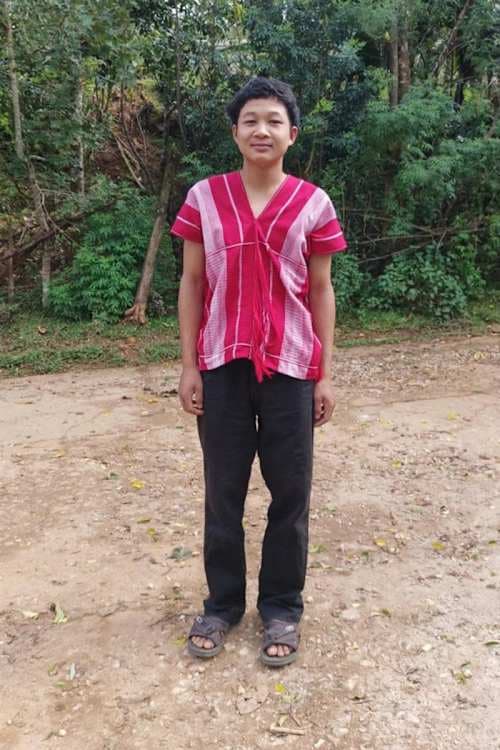 An unsponsored boy named Taweerat from Thailand who has waited 354 days for a sponsor.