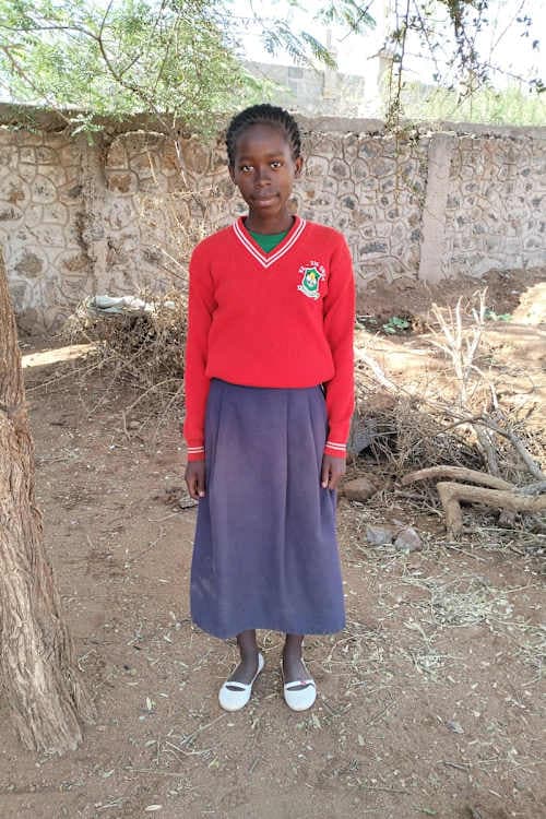 An unsponsored girl named Kavemba from Kenya who lives in an AIDS-affected area and has waited 446 days for a sponsor.