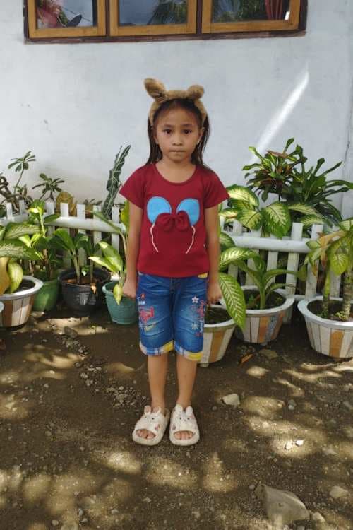 An unsponsored girl named Claudia from Indonesia who has waited 489 days for a sponsor.