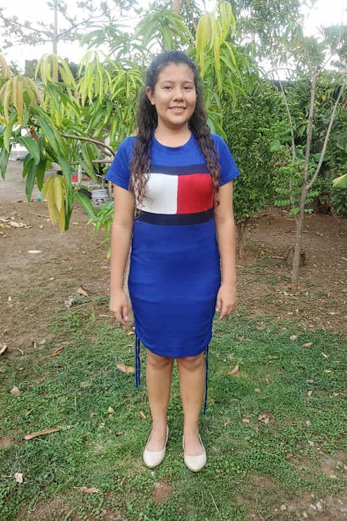 An unsponsored girl named Cristela from El Salvador who has waited 381 days for a sponsor.