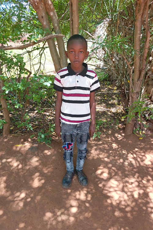 An unsponsored boy named Nicholas from Kenya who lives in an AIDS-affected area and has waited 619 days for a sponsor.