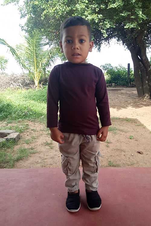 An unsponsored boy named Jenuvin from Sri Lanka who has waited 612 days for a sponsor.