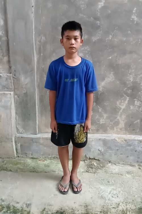 An unsponsored boy named Ridho from Indonesia who has waited 575 days for a sponsor.