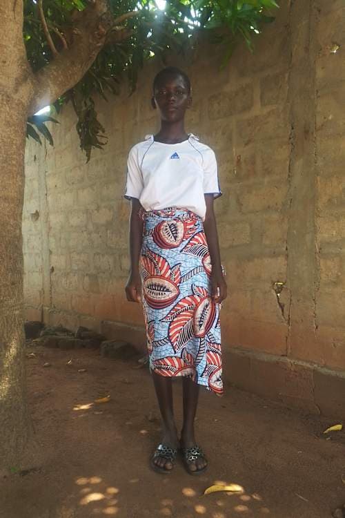 An unsponsored girl named Mefia from Togo who lives in an AIDS-affected area, is vulnerable to exploitation and has waited 430 days for a sponsor.