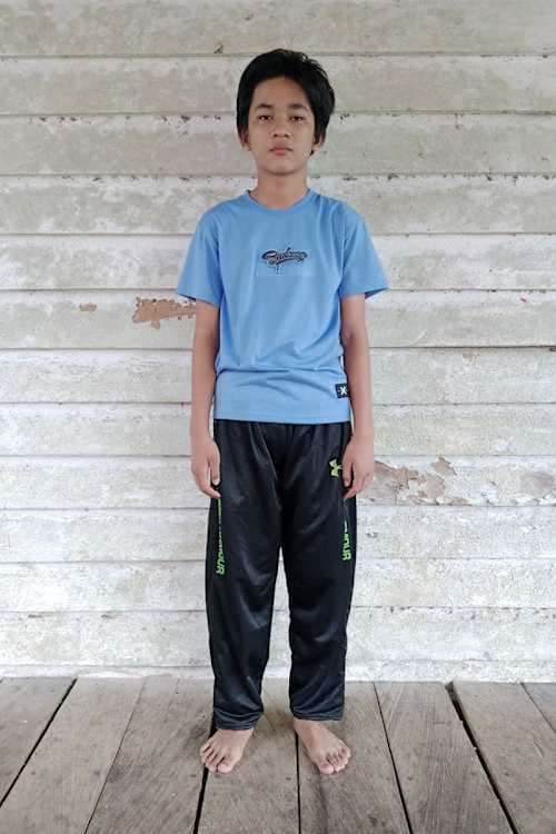An unsponsored boy named Fandi from Indonesia who has waited 396 days for a sponsor.