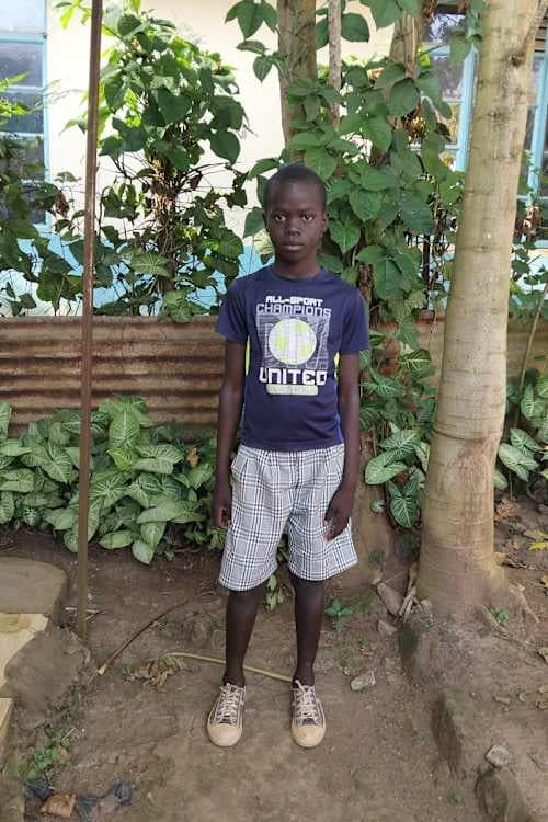 An unsponsored boy named Wayne from Kenya who lives in an AIDS-affected area and has waited 640 days for a sponsor.