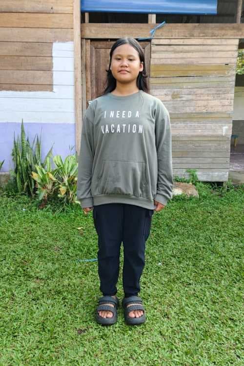 An unsponsored girl named Seli from Indonesia who has waited 253 days for a sponsor.