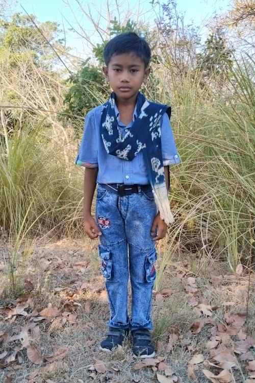 An unsponsored boy named Evan from Indonesia who has waited 410 days for a sponsor.