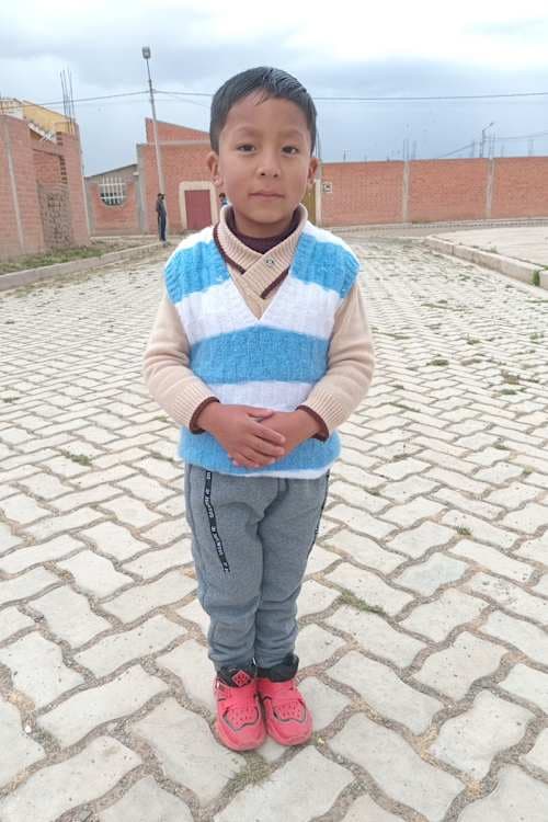 An unsponsored boy named Asbel from Bolivia who has waited 514 days for a sponsor.