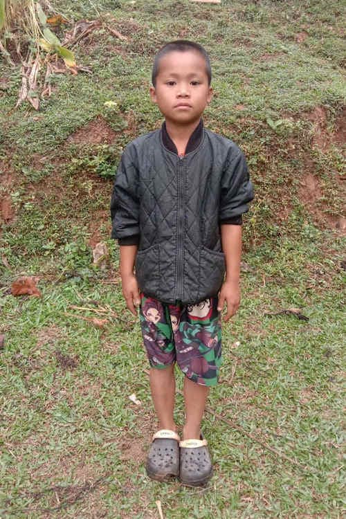 An unsponsored boy named Kridsda from Thailand who has waited 570 days for a sponsor.