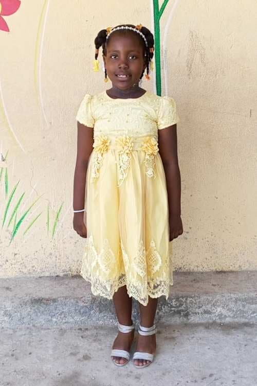 An unsponsored girl named Esther from Haiti who is vulnerable to exploitation and has waited 798 days for a sponsor.