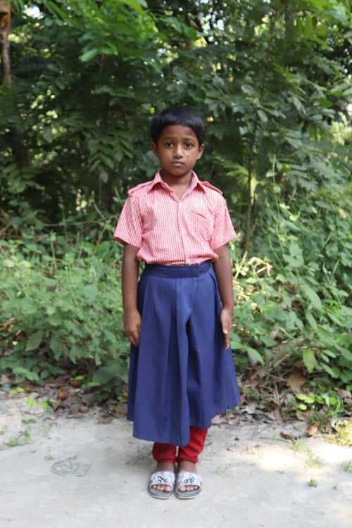 An unsponsored girl named Toma from Bangladesh who is vulnerable to exploitation and has waited 500 days for a sponsor.