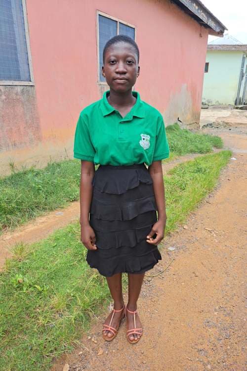 An unsponsored girl named Theodora from Ghana who lives in an AIDS-affected area and has waited 336 days for a sponsor.