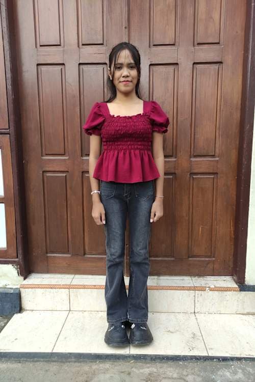 An unsponsored girl named April from Indonesia who has waited 314 days for a sponsor.