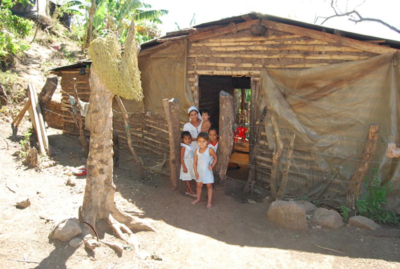 El Salvador Family in Doorway of Home
