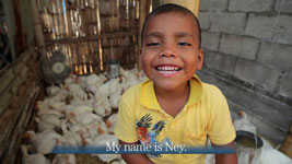 Ecuador: Ney Feeds His Chickens video