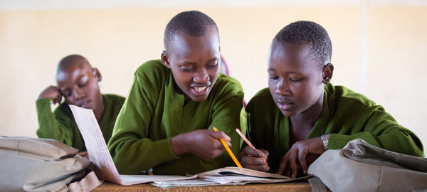 Two boys from Tanzania studying together