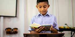 Boy reading the Bible