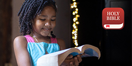 Girl reading the Bible