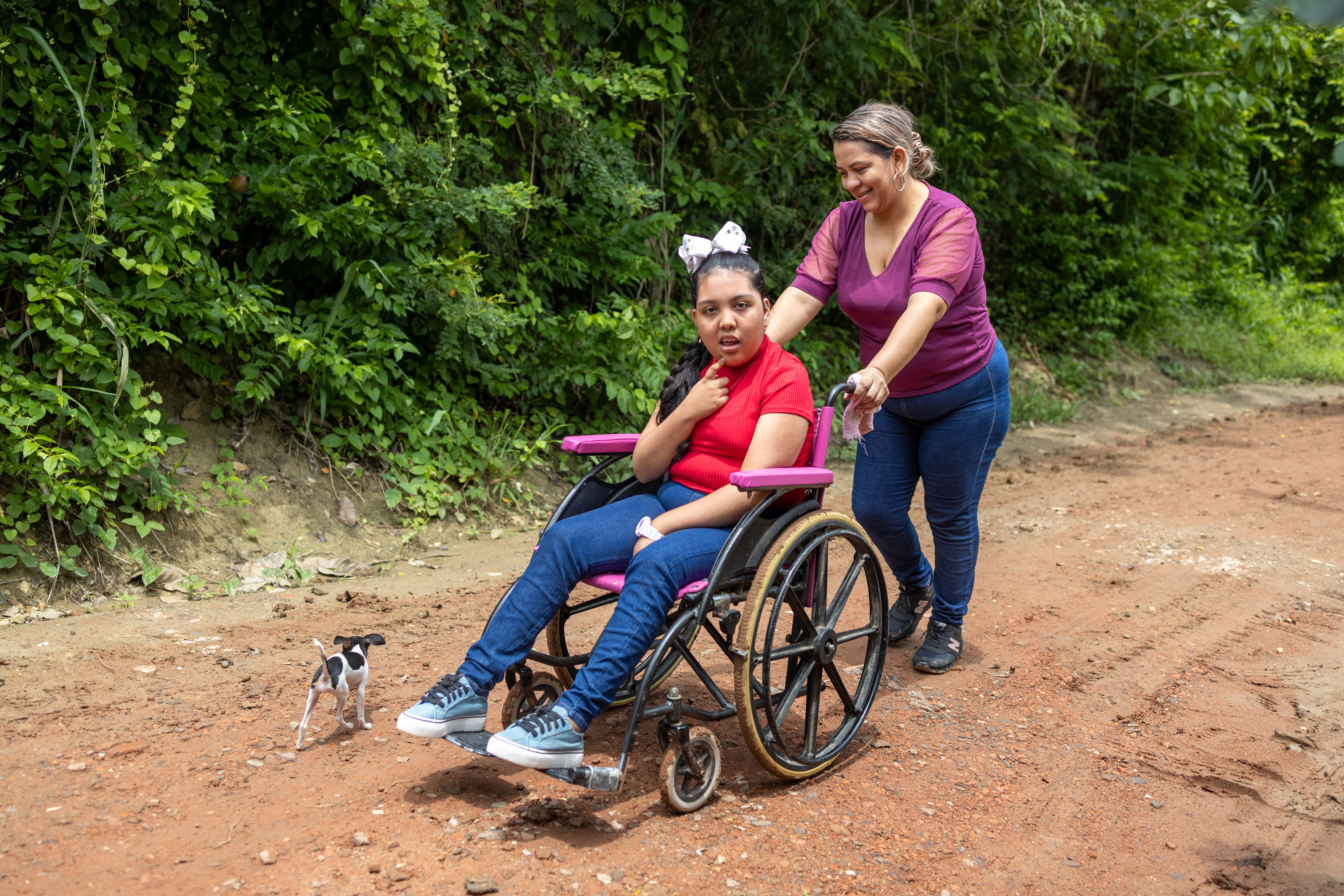 Melany and her mother, Kelly, near their home in Colombia.