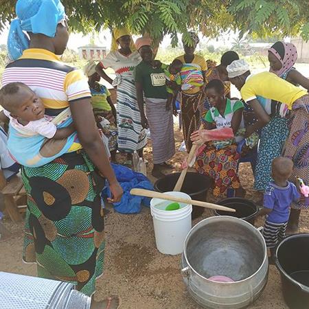 A group of moms from Togo learn to make soap