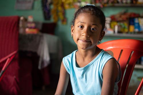 child looks at camera