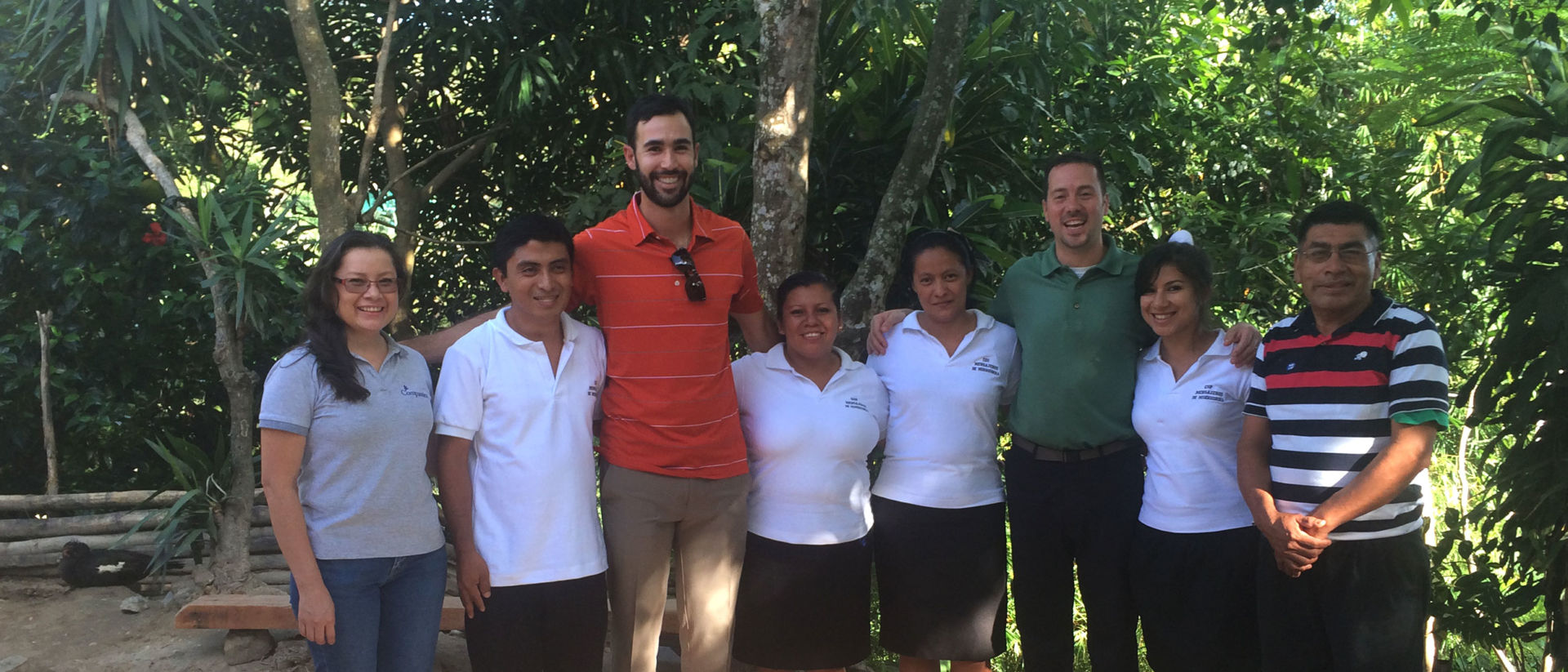 Cameron Tringale and the staff at a Compassion center in El Salvador