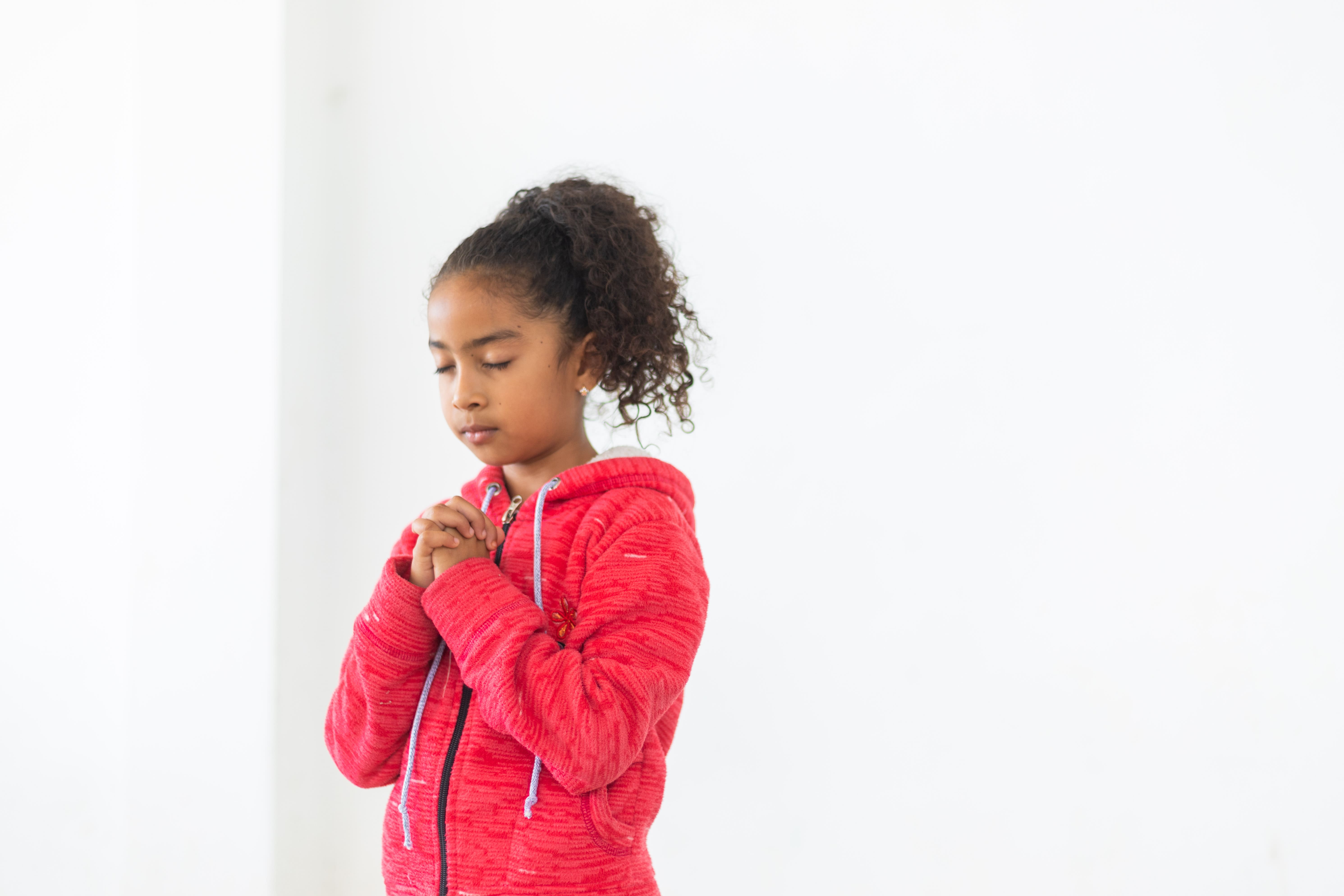 small child praying