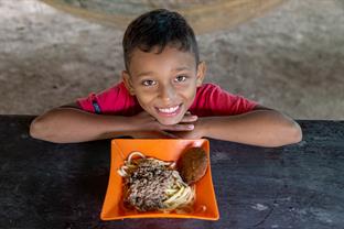 Angel is ready to eat his lunch