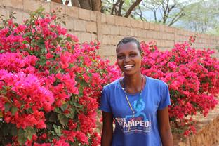 Arima smiles at the camera