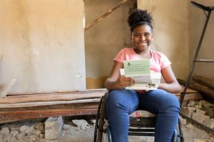 Scarle reads a letter from her sponsor