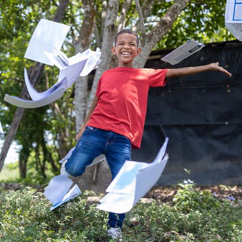 Child dancing with letters