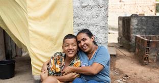 Patricia hugs her son Wesley