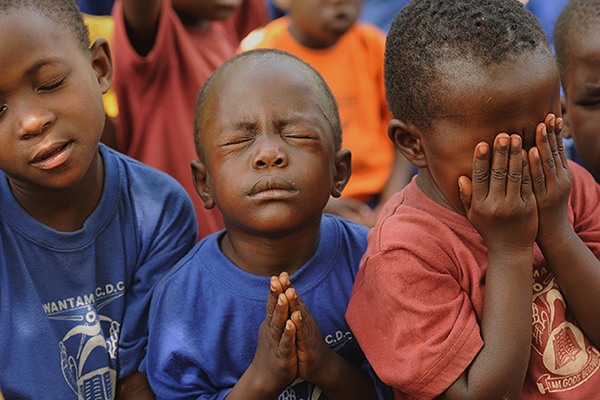 boys praying