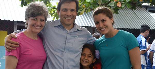 Compassion International President Jimmy Mellado with his wife, daughter and Compassion-assisted child