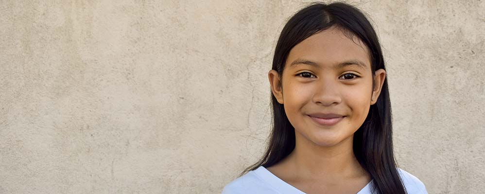Child in Philippines smiling