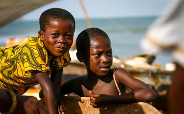 Two boys near the ocean in Ghana
