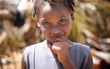 A Haitian girl in Compassion's program after surviving Hurricane Matthew