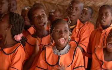 A group of children singing