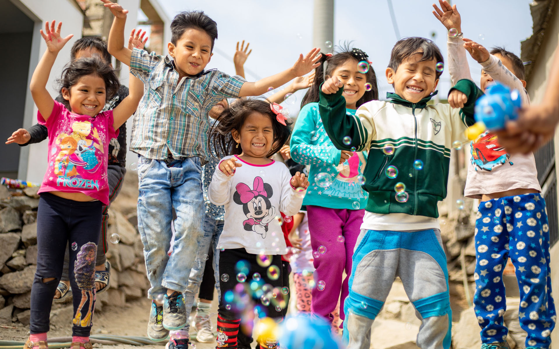 Children in Lima, Peru play at their Compassion center.