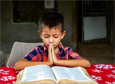 Give a child the gospel by donating a Bible