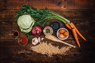 Vegetables, oils, and grains on a table